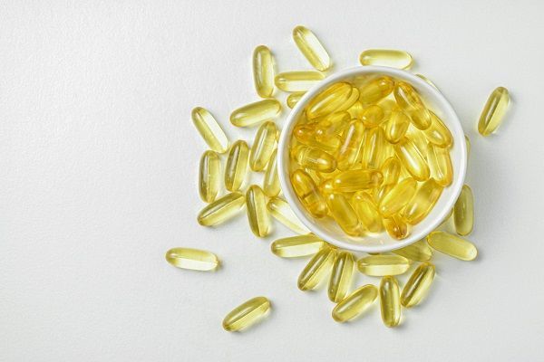 diverse capsule di vitamina D per prevenire caduta di capelli